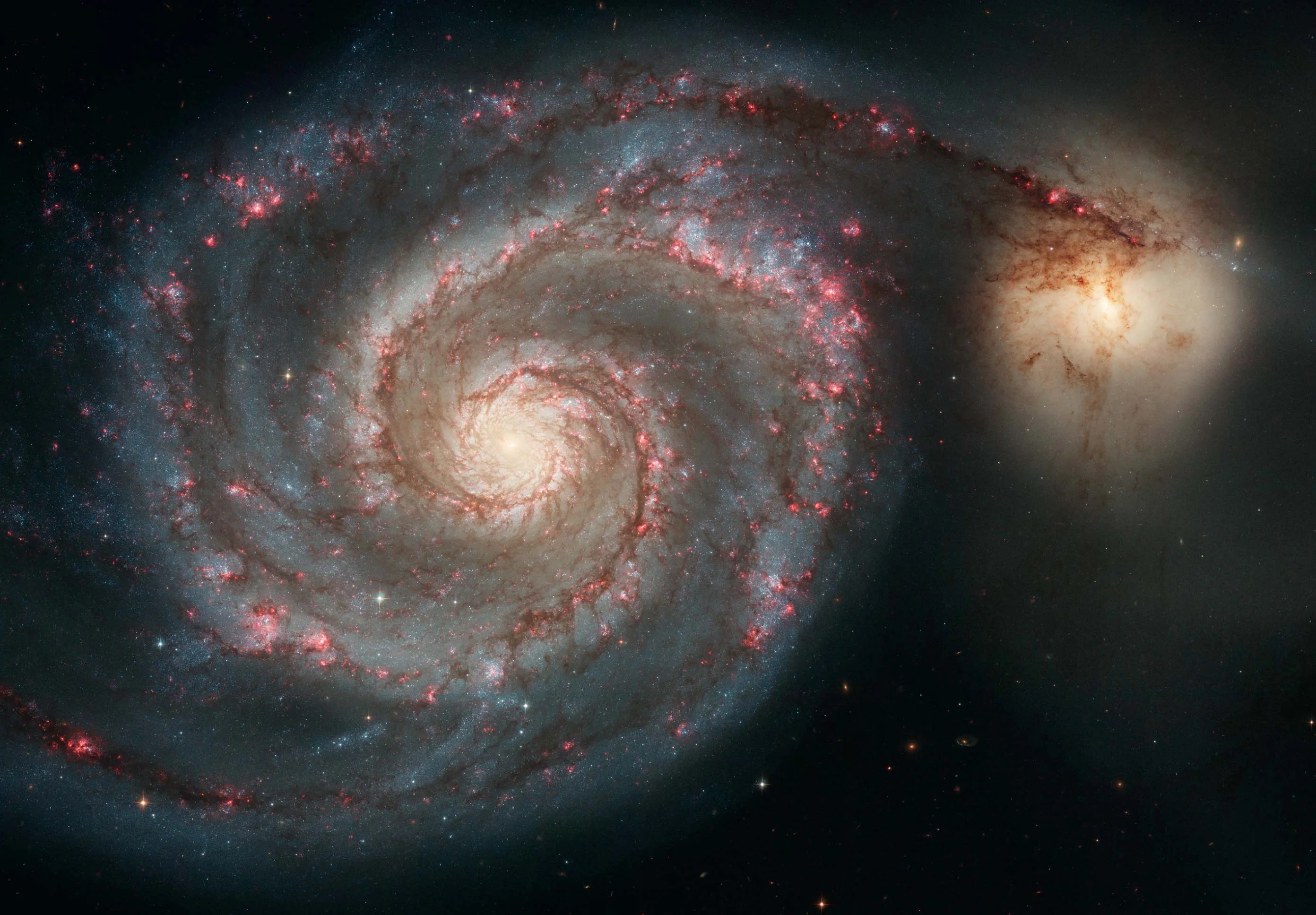 Whirlpool Galaxy and companion galaxy captured by Hubble
